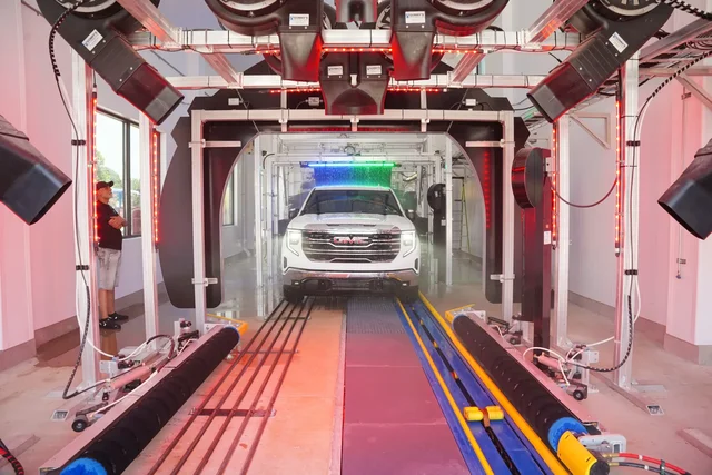 White truck in car wash tunnel